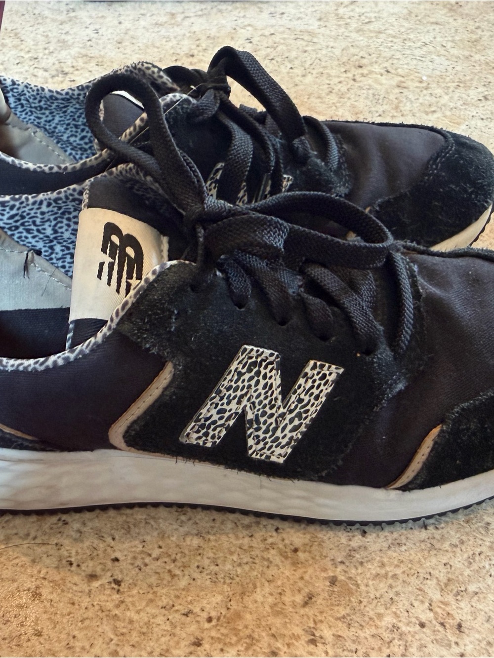 New Balance Black Sneakers with White Leopard 'N' Accent